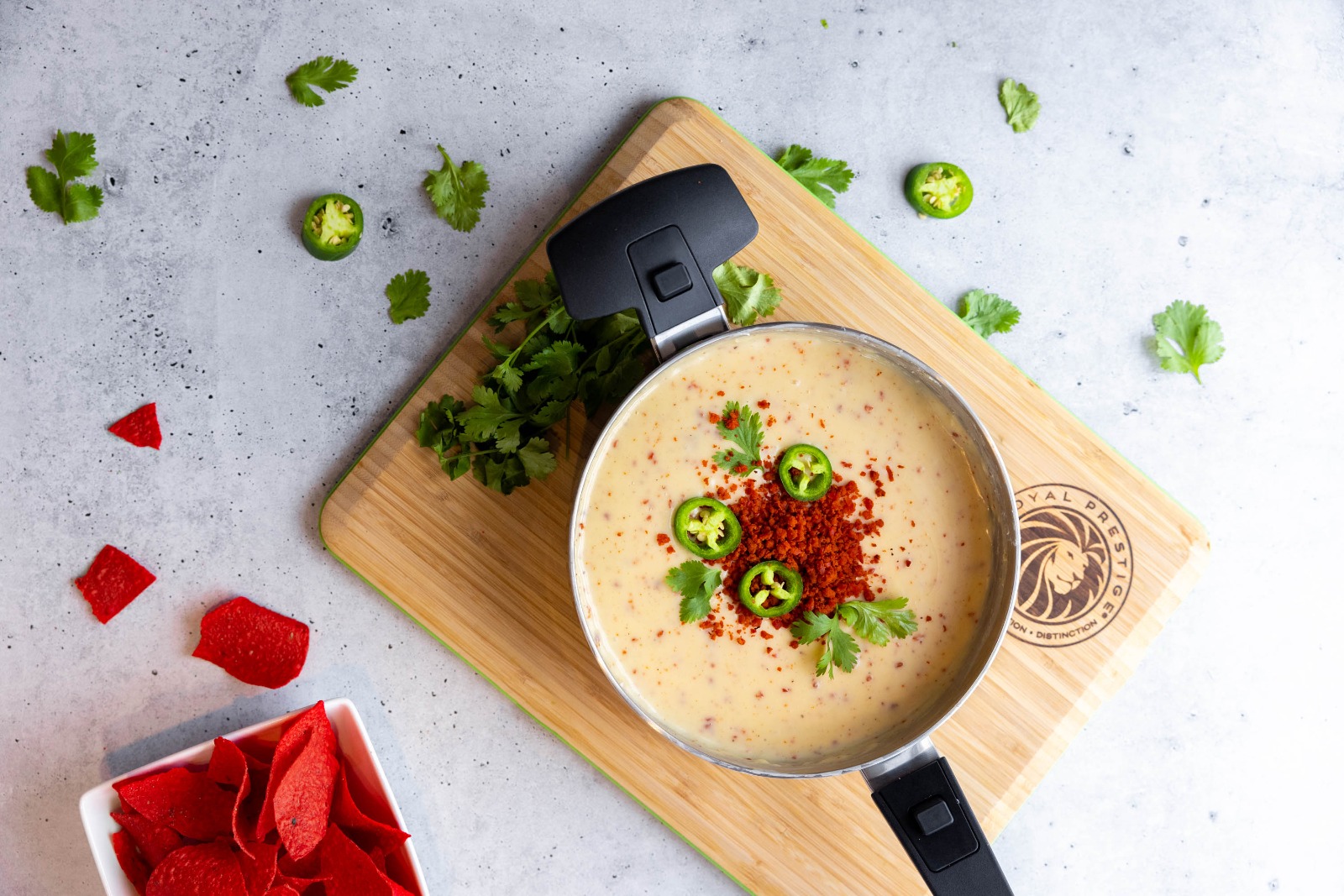 A vibrant image of a professional chef using a Royal Prestige cookware set in a bustling kitchen. The chef expertly prepares a gourmet meal, showcasing the cookware's versatility and ability to handle diverse cooking tasks.  The image should convey a sense of skill, confidence, and culinary excellence.